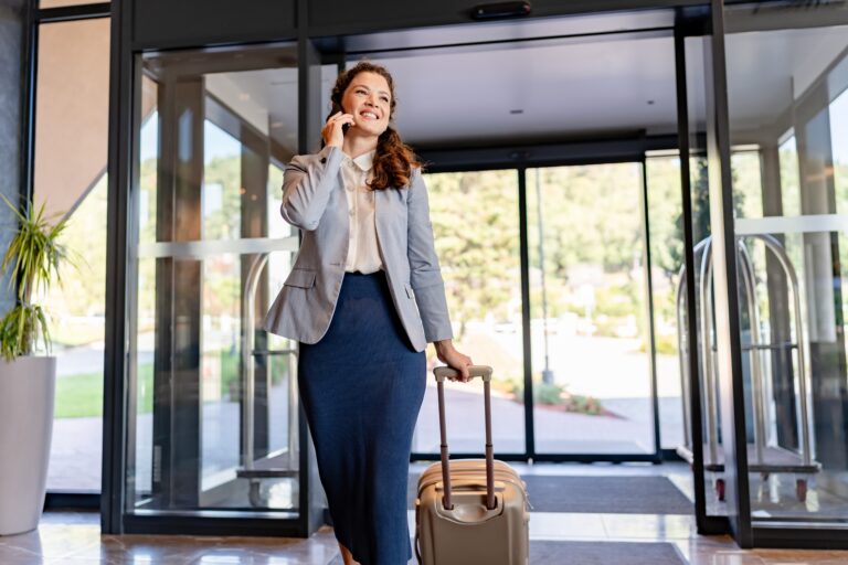 Female business professional entering hotel
