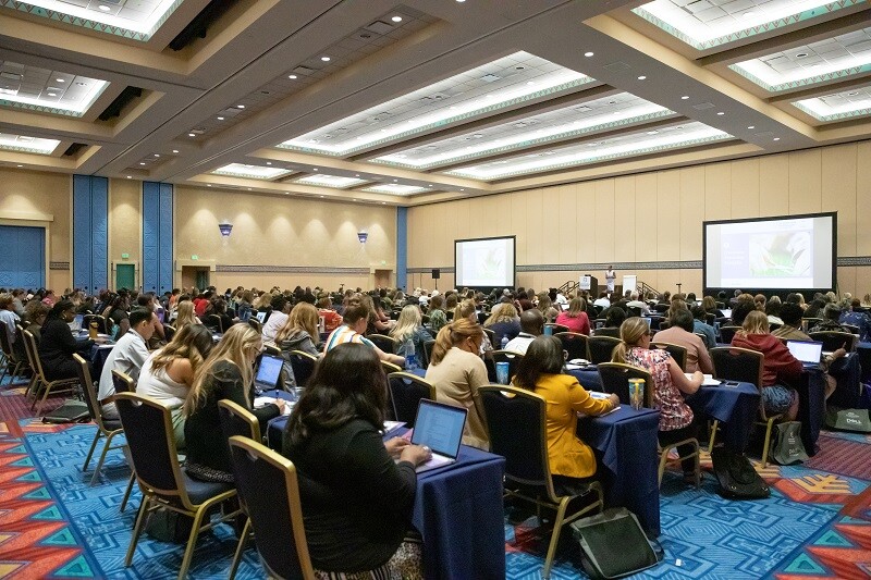 Administrative attendees in session at APC 2022 in Orlando.