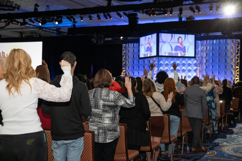 APC 2023 attendees participating in reflection exercise 